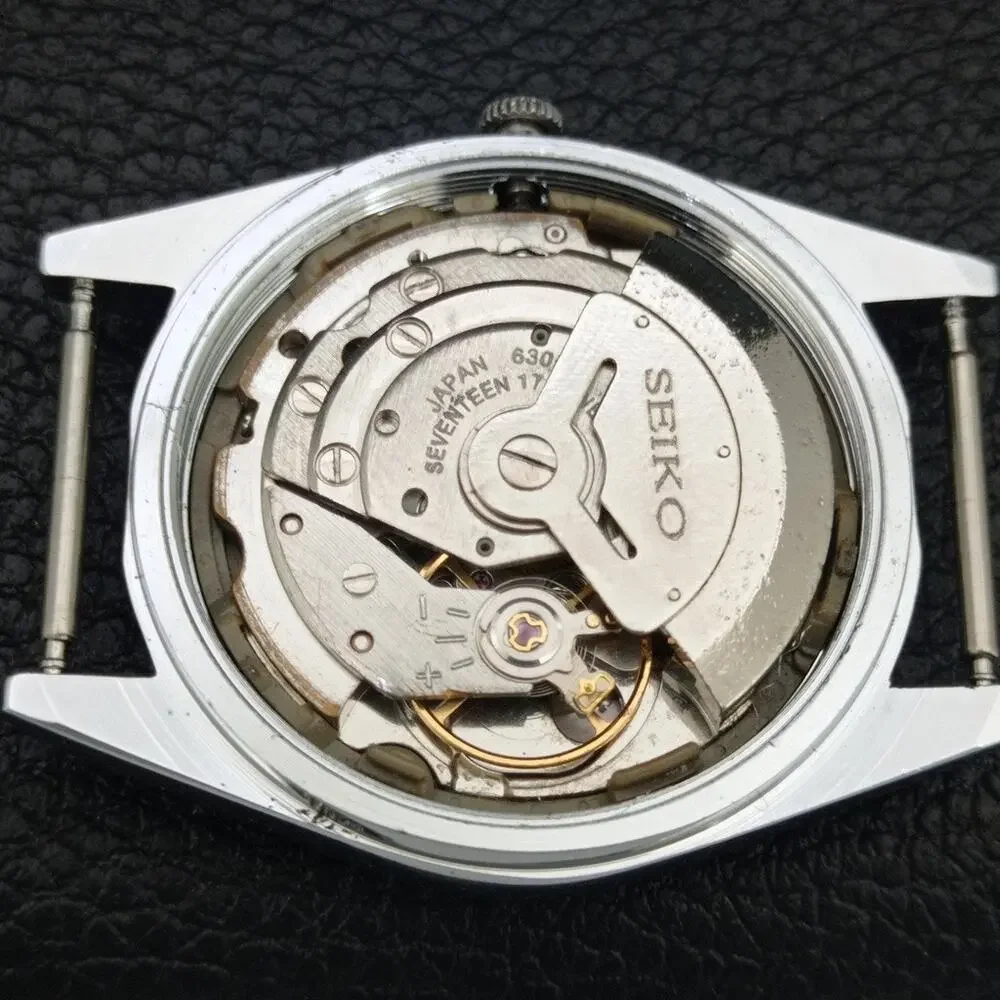 Vintage 1976 Seiko Automatic Mens Silver Watch W/daydate & Gold Accents